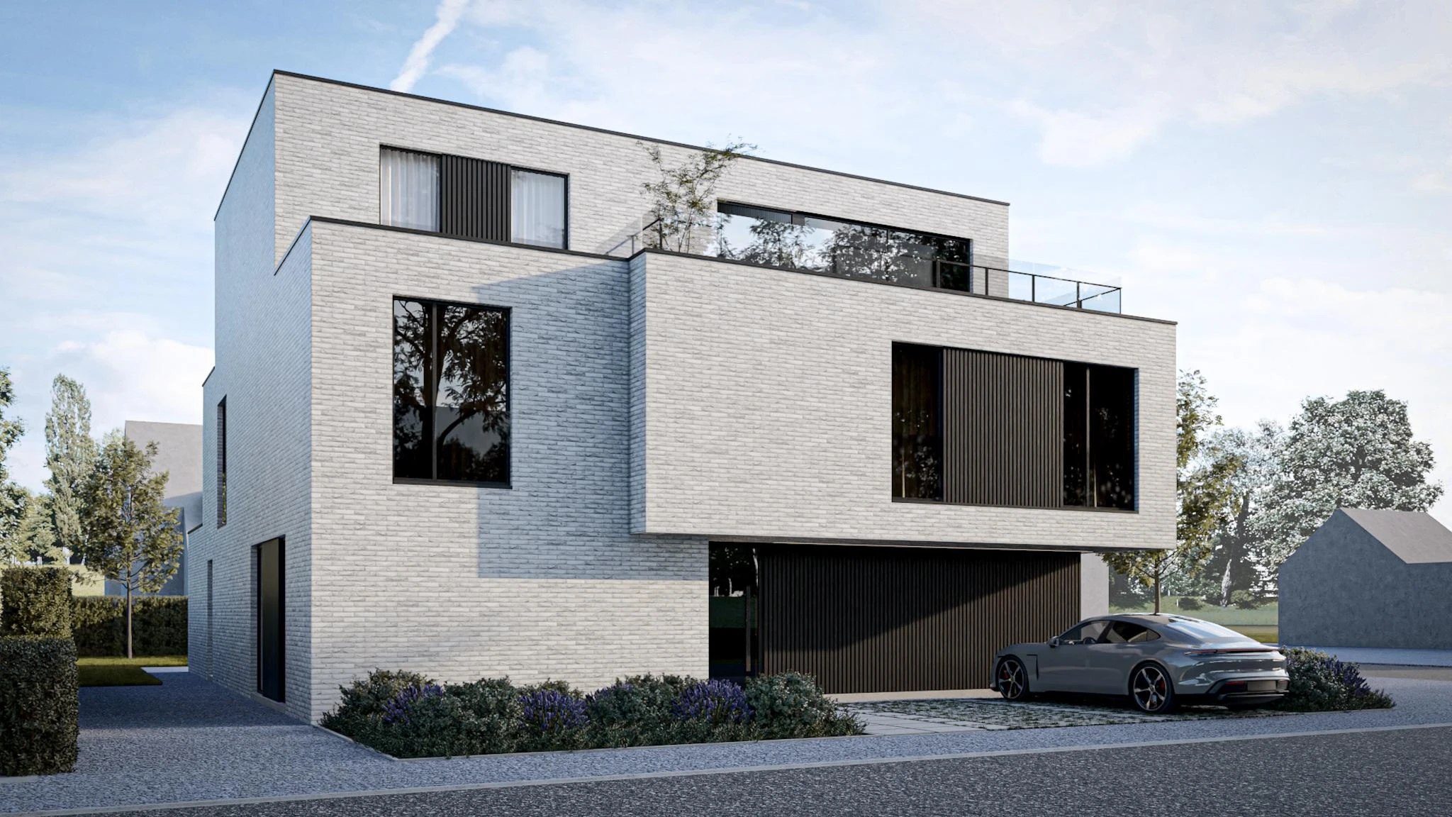 Modern wit bakstenen appartementsgebouw met strakke architectuur, zwarte verticale gevelbekleding en een ruim dakterras met glazen balustrade.